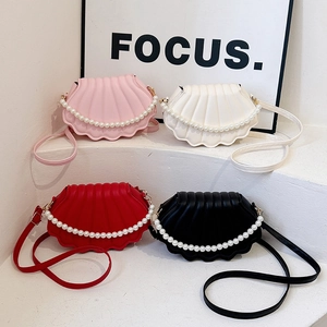 Chic shell-shaped bags in pink, white, red, and black with elegant pearl handles