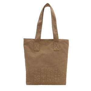 Minimalist brown canvas tote bag with textured embroidery and stylish KTMU design