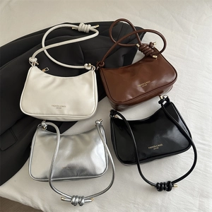 Fashionable large capacity crescent shoulder bags in white, brown, black and silver