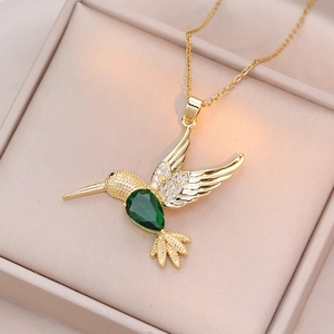 Golden hummingbird necklace with green pear gemstone and sparkling zircon wing details