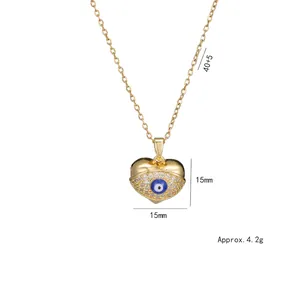 Collier cœur doré avec pendentif Mauvais Œil, cristaux de zircon et dimensions 15x15mm
