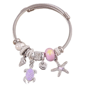 Marine themed beaded charm bracelet with starfish, turtle pendants and pink glass beads