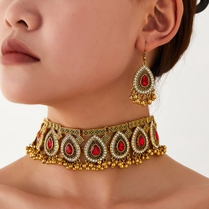Vintage gold choker and water drop red gemstone earring set with tassels on model