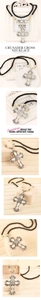 Close-up of crusader cross necklace with opal stone and vintage beaded chain detail