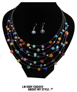 Detailed close-up of Bohemian multi-layer beaded necklace and matching earrings set