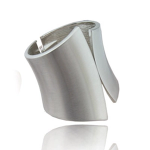 Wide irregular overlapping cuff ring in matte silver with a brushed metal texture