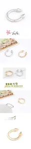 Close-up of adjustable C-shaped rings with cone studs in gold and silver finishes
