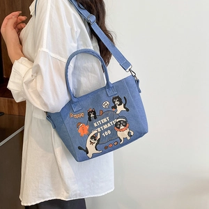 Large capacity blue denim tote bag with cute cartoon cat print and adjustable shoulder strap