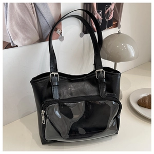 Detail of black PU leather tote bag with transparent PVC pocket and adjustable straps