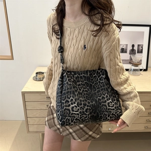 Chic large leopard print tote bag for women shown with beige knit sweater for daily commute
