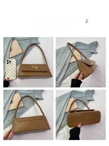 Vues multiples d'un sac à bandoulière marron avec boucle nœud doré et cuir PU texturé