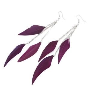 Elegant purple feather long tassel earrings with silver metal chains on white background