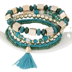 Bohemian multi-layer beaded bracelet set with turquoise tones and silk tassel detail