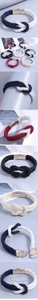 Macro shot of braided PU leather bracelets featuring gold magnetic clasps and various colors