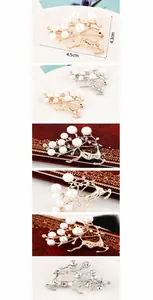 Detail showing elegant deer brooch with white pearls and sparkling rhinestones
