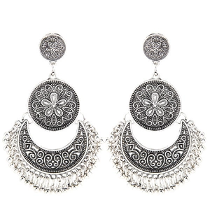 Bohemian vintage silver tassel earrings with floral engraving and crescent drop
