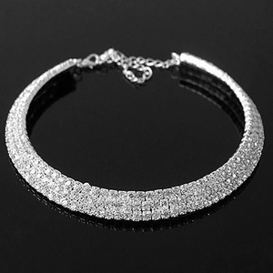 Macro view of multi-row rhinestone bridal choker with adjustable lobster clasp on silver chain