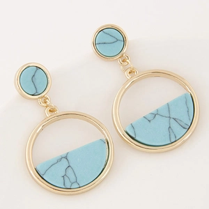 Elegant gold geometric earrings with light blue marble texture in a circular drop design