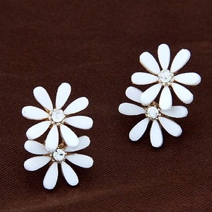 Elegant double layered white daisy earrings with crystal center and golden finish