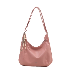 Pink glossy leather hobo bag with braided rope charm and minimalist branding
