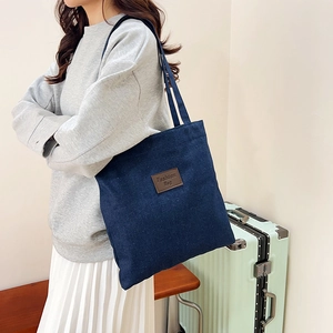 Large dark blue denim tote bag with leather patch for women casual commute travel