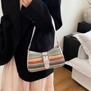 Rainbow striped woven shoulder bag with white leather trim and silver buckle accent