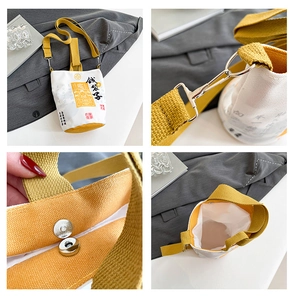 Close-up of canvas drawstring bag with Chinese calligraphy and magnetic snap closure