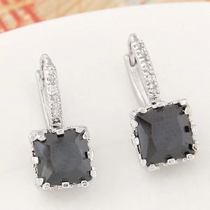 Silver square black zircon earrings with small crystal accents shown from a side view