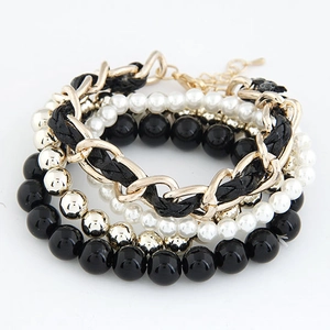 Ensemble de bracelets bohèmes avec perles noires, perles fantaisie et chaîne dorée tressée