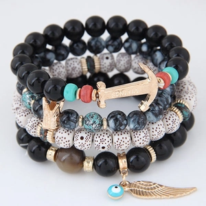 Set di bracciali bohémien multistrato con ciondoli a forma di ancora, piuma e malocchio
