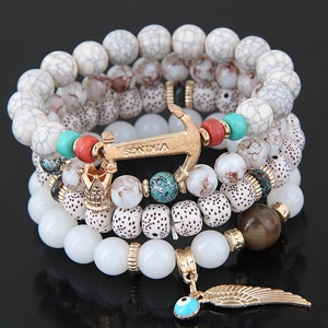 Set braccialetti con perline stile boho con ciondoli ancora, ala e malocchio
