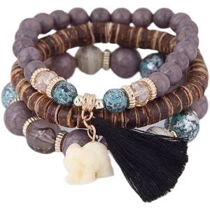 Detail view of Bohemian multi-layer beaded bracelets with elephant charm and tassel