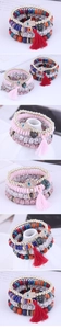 Detail of bohemian layered elastic seed bead bracelet with tassel and evil eye charm