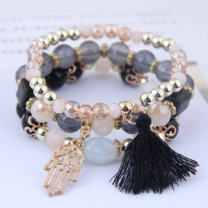 Bohemian multi-layer beaded bracelet set with Hamsa Hand charm and black fringe tassel