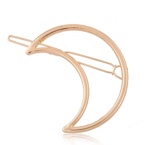 Barrette à cheveux minimaliste en forme de croissant de lune dorée au design évidé