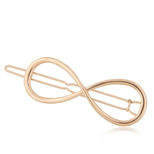 Barrette à cheveux minimaliste symbole infini doré avec une finition métallique polie
