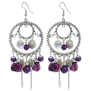 Long bohemian silver earrings with purple beads and metal tassels on white background