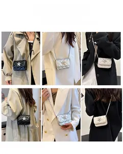 Quilted mini crossbody bag with star detail shown in black, silver, and cream white