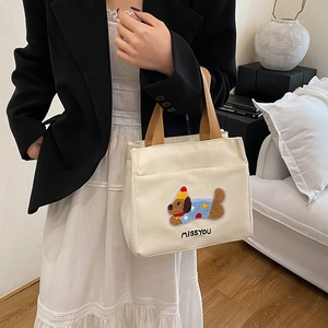 Petit sac en toile crème avec broderie chien et anses marron pour usage quotidien