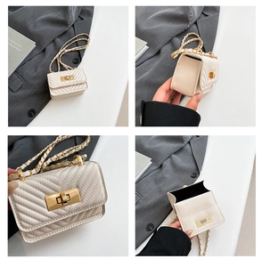 Detailed view of mini white quilted crossbody bag with gold chain strap and turn-lock