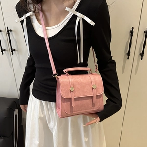 Petit sac à bandoulière rose en cuir PU pour femme avec poignée et sangle réglable