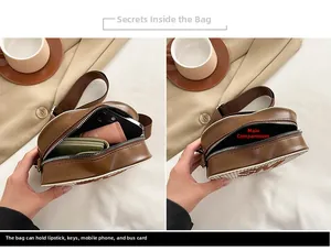Détail d'un sac en cuir PU bicolore montrant le rangement interne pour téléphone et portefeuille