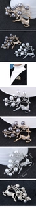 Detailaufnahme der Rentier-Brosche mit Perlen und Strasssteinen auf dem Metallgeweih
