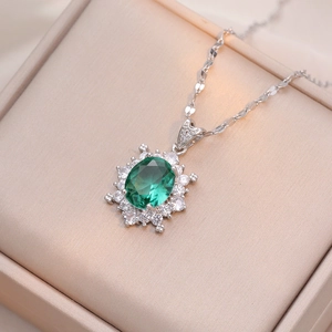 Elegant emerald green zircon flower pendant necklace in a premium jewelry gift box