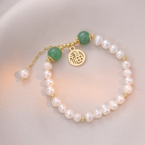 Baroque freshwater pearl bracelet with green beads and golden Fu character pendant