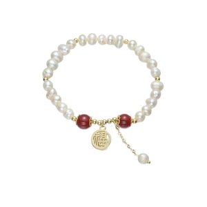 Elegant freshwater pearl bracelet with red beads and golden Fu character charm