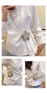 Three-way view of star-shaped silver clutch bag with rhinestones and metal chain