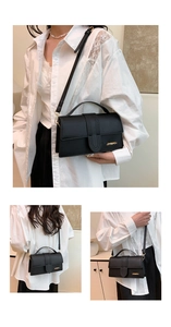 Close-up of black rectangular crossbody bag with gold JINGPIN logo and top handle