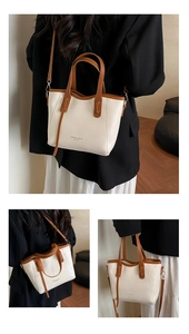 Detail of cream and brown patchwork tote bag featuring Fashion & Bags Leather text