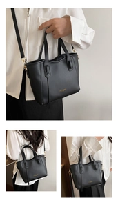 Black pebbled leather tote bag with gold hardware and multiple carrying styles